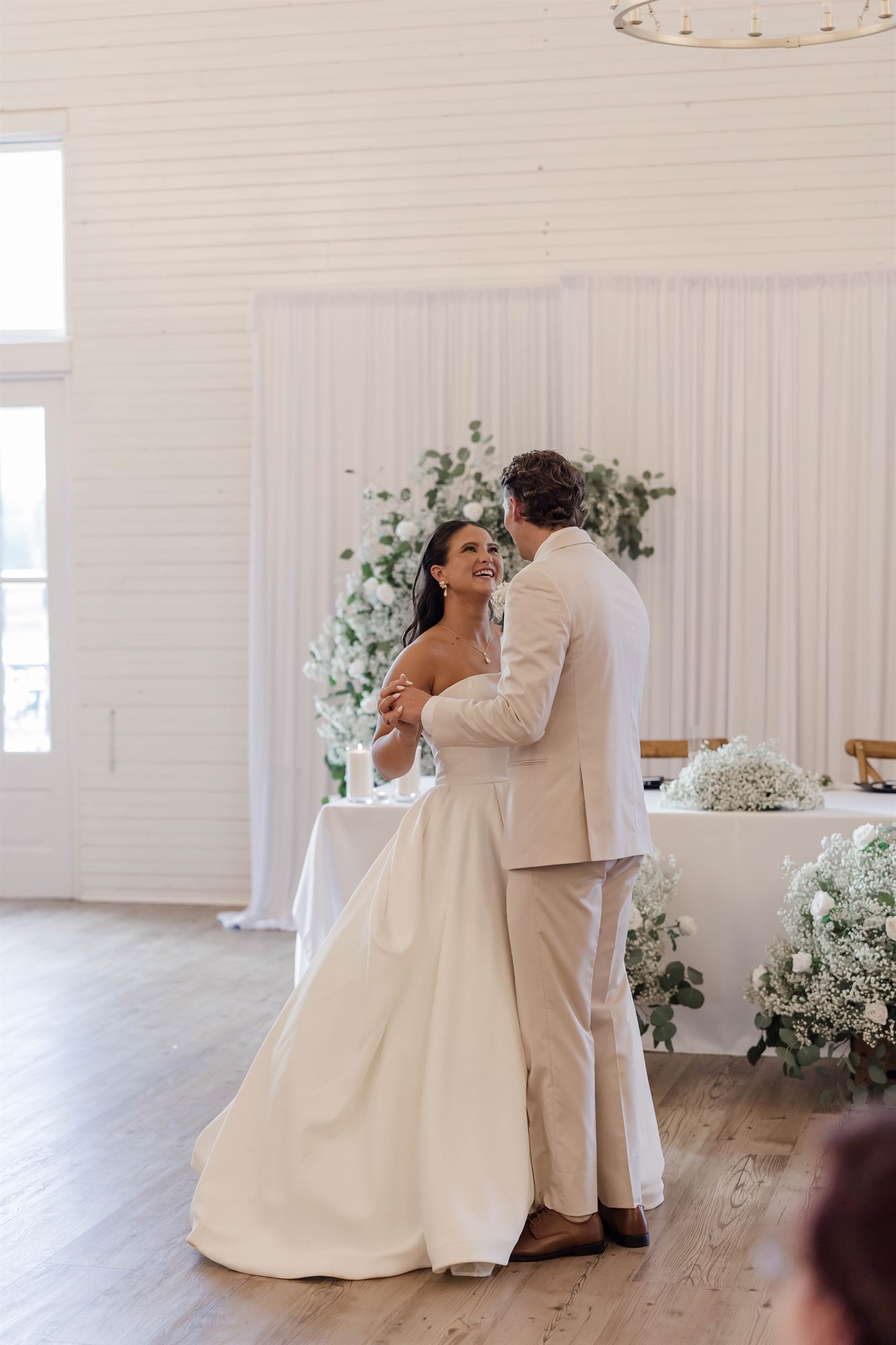 Couple dancing in the winery